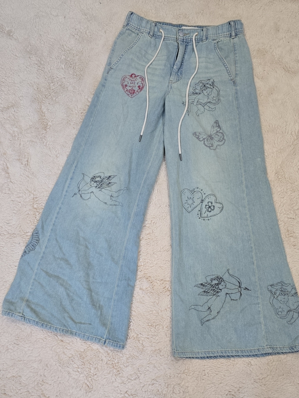 Pilcro Light Blue Wide-Leg Jeans with Cherub and Butterfly Prints